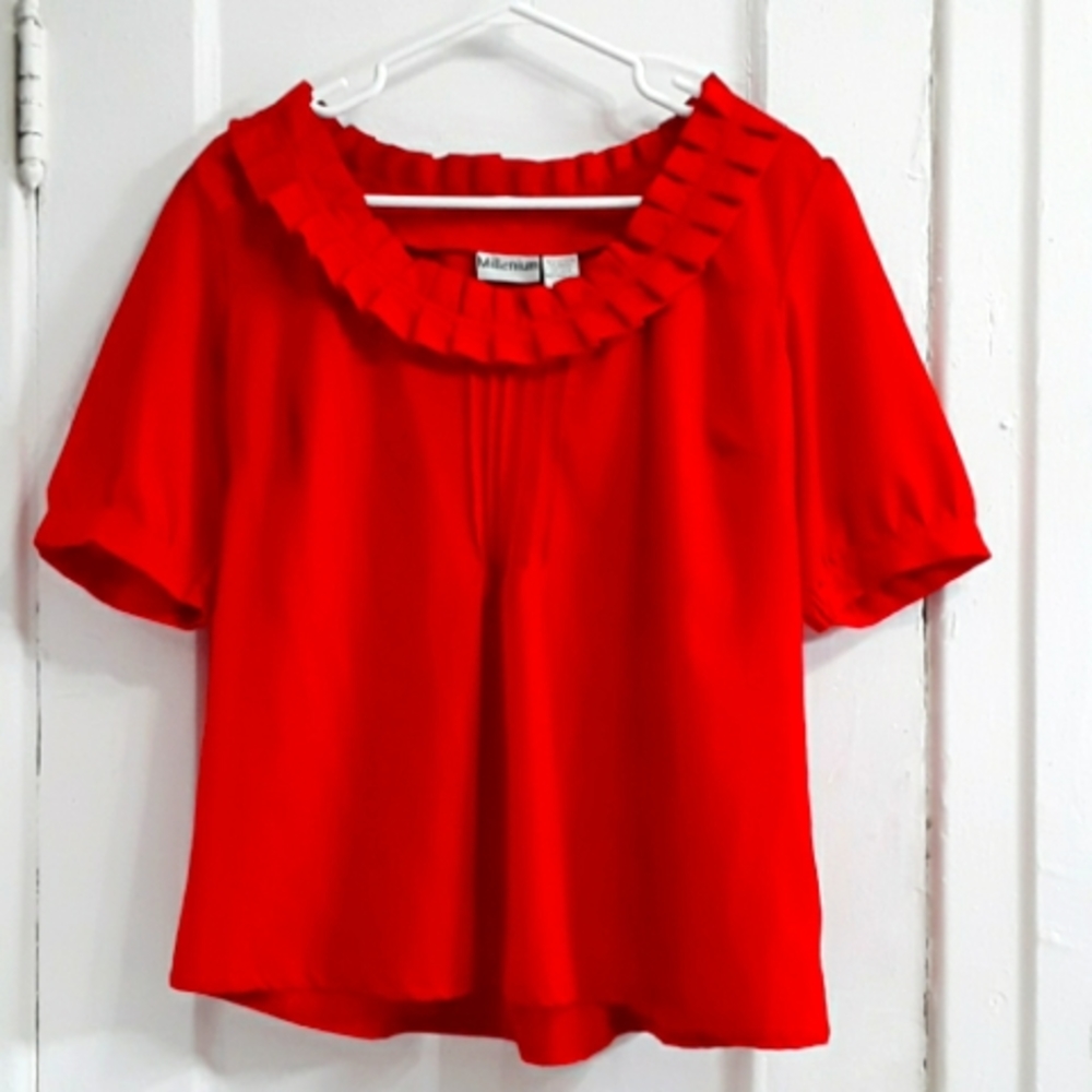 Ruffled collar, short sleeve bright-red blouse.